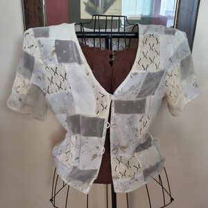 Vintage cream colored crochet lace and floral patchwork short sleeve cardigan